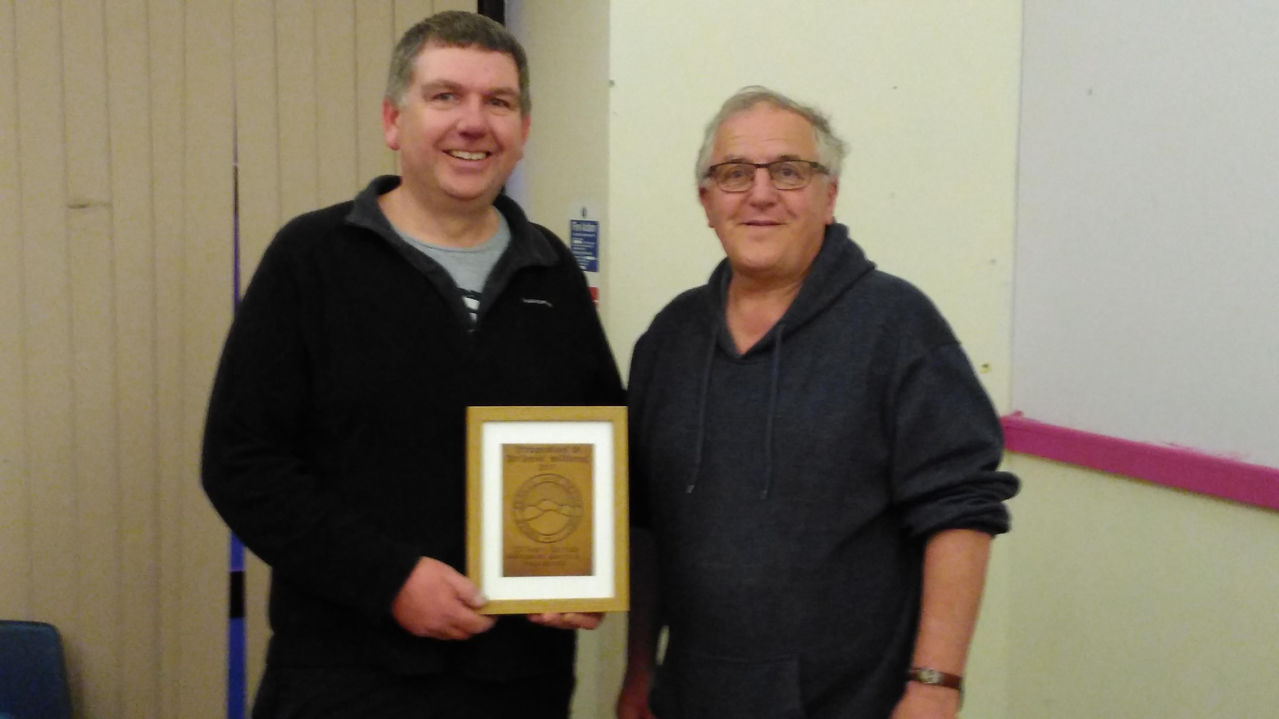David being presented with his Leather Plaque by Chairman Brian Tyson