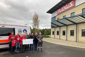 Plexus present BSARU team members with cheque